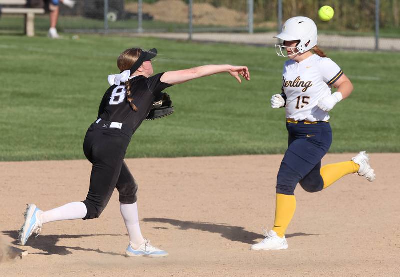 Prairie Ridge's Adysen Kiddy tries to turn a double play after forcing out Sterling's Kennedy Tate during their Class 3A sectional semifinal game Wednesday, May 29, 2024, at Sycamore High School.