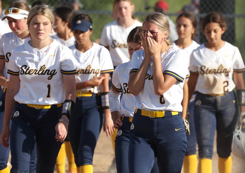 Sterling players become emotional after their Class 3A sectional semifinal loss to Prairie Ridge Wednesday, May 29, 2024, at Sycamore High School.