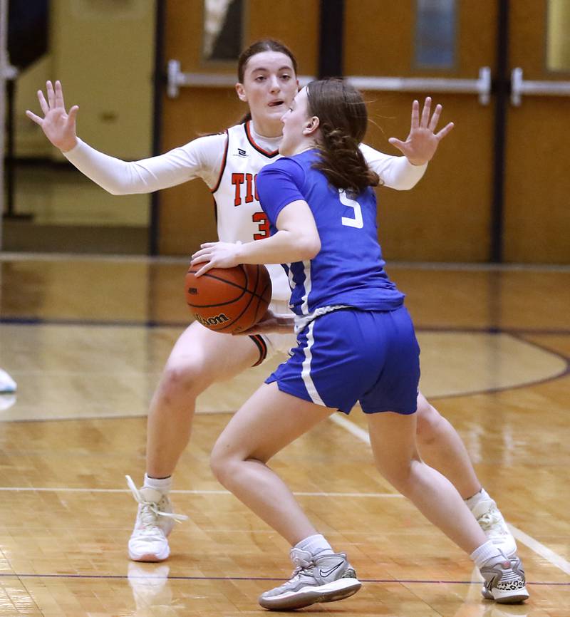 Crystal Lake Central's Katie Hamill guardsBurlington Central's Audrey LaFleur during the IHSA Class 3A Woodstock Regional Championship girls basketball game on Thursday, Feb. 15, 2024, at Woodstock High School.