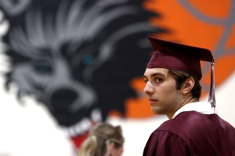 CJ Zaharias lines up for Prairie Ridge High School’s commencement at the school in Crystal Lake on Saturday.