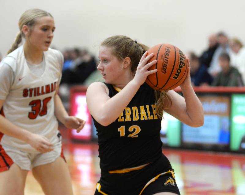 Riverdale's Makayla Oleson (12) pulls the ball away from a Stillman Valley's Alyvia Bagg (31) on Tuesday. Feb. 20, 2024 at the 2A Oregon Sectional held at the Blackhawk Center at Oregon High School.