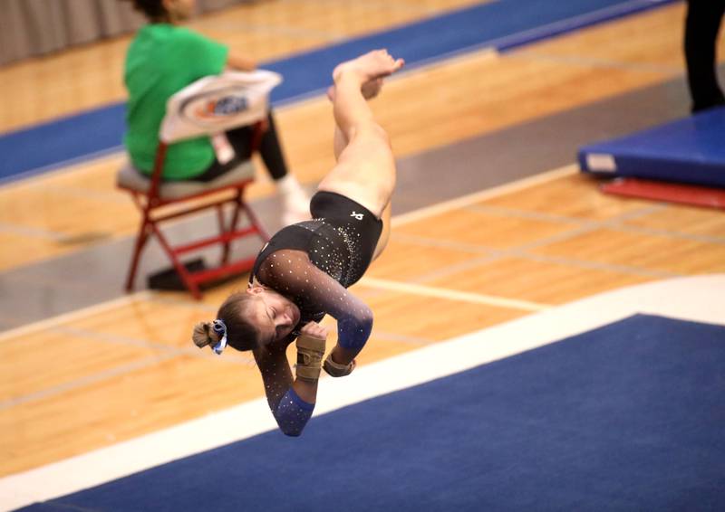 Geneva’s Brooke Lussnig competes on the floor exercise during the IHSA Girls State Gymnastics Meet at Palatine High School on Friday, Feb. 16, 2024.