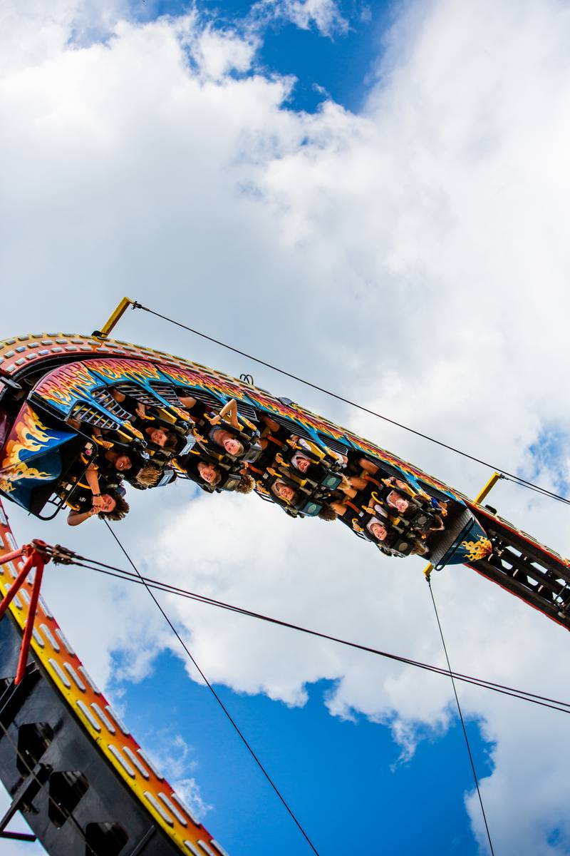 Festival goers hang upside down on the “Ring of Fire” during the Downer’s Grove Rotary Fest, Saturday, June 22, 2024.

Suzanne Tennant/For Shaw Local News Media