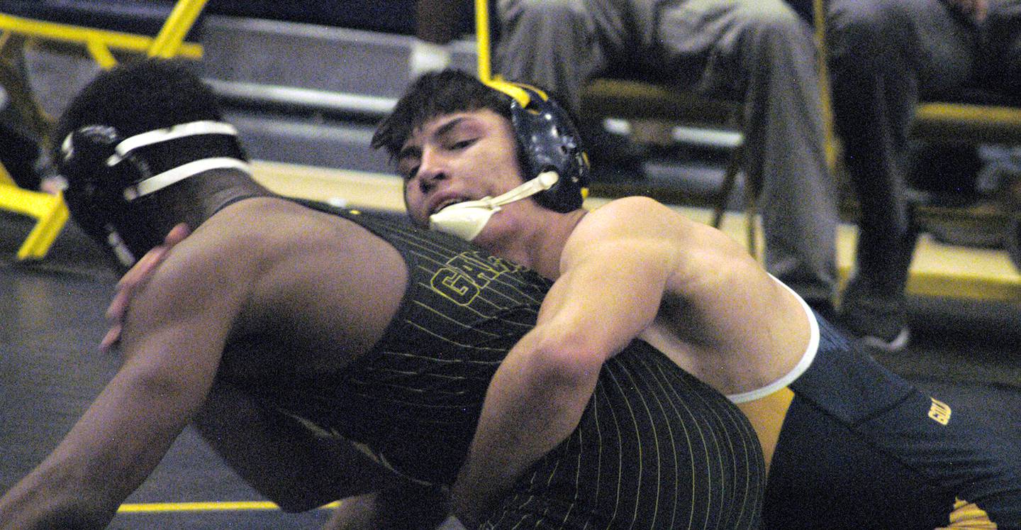 Sterling's Isaiah Mendoza (right) holds onto Galesburg's Josiah Carter (left) in the 157-pound championship. The action took place on Saturday, Dec. 2, 2023, at Sterling High School's 45th Annual Carson DeJarnatt Tournament.